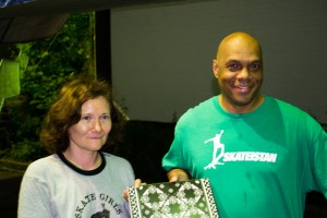 Bryan Ridgewood presents Tati with The Skateistan Book